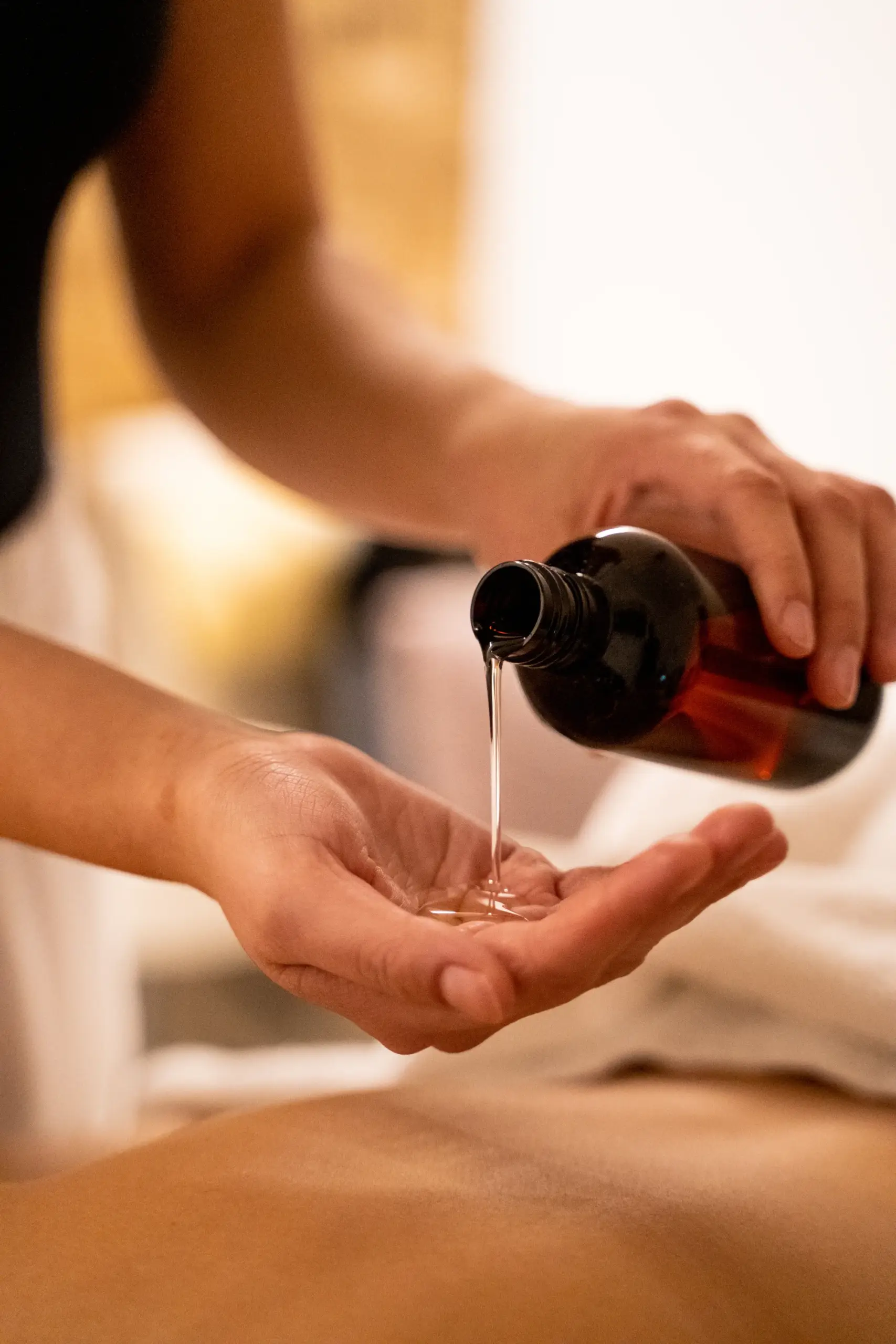 Massagem com Óleo Arnica